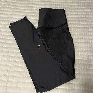 Lululemon cropped leggings. Dark Gray/Black pinstriped. Women’s size 6.